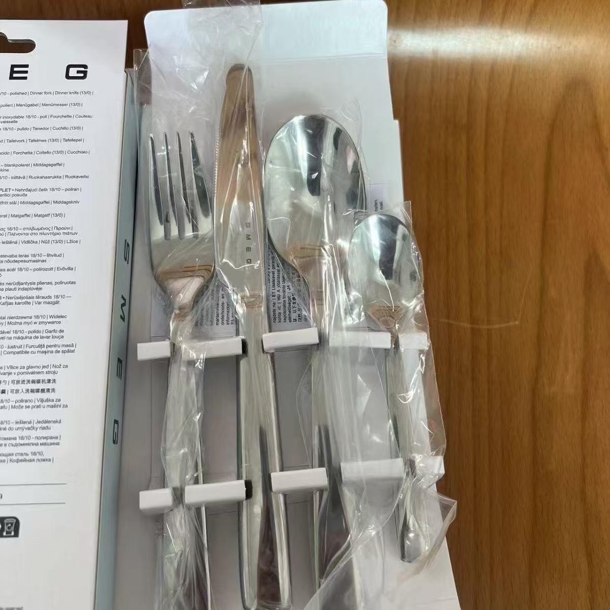 Bộ dao dĩa muỗng 4 món của SMEG thương hiệu Ý inox 304 cao cấp