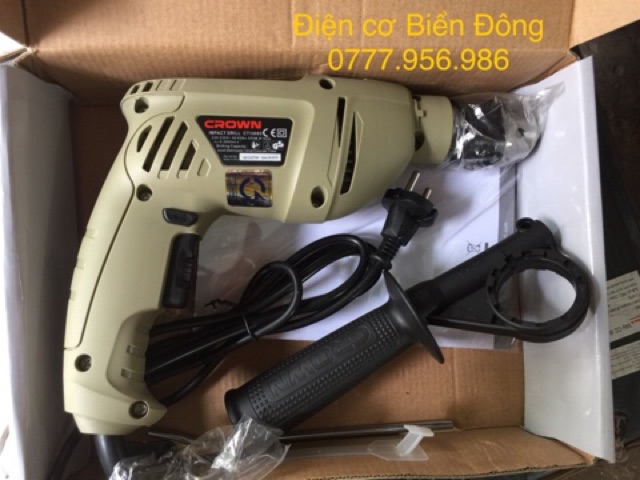 Máy khoan CROWN CT10065chuyên dùng để khoan bê tông, sắt, tường, gỗ, tôn, bắn vít